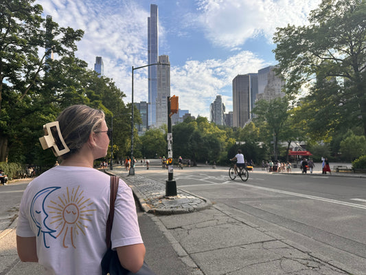 Busy, bustling city and a girl finding balance within the chaos between her professional life and personal life. 